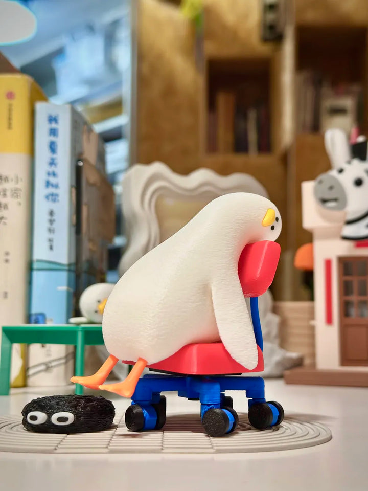 Lying Flat Duck in Rotatable Chair – 3D Printed Lazy Duck Figurine